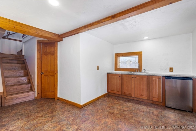 interior space with beam ceiling, sink, and stainless steel dishwasher