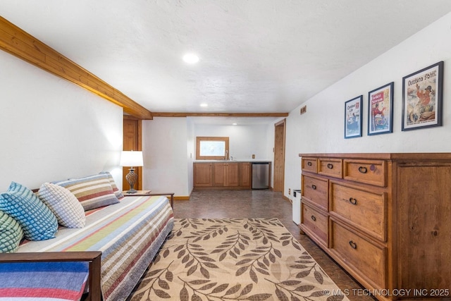 bedroom with fridge