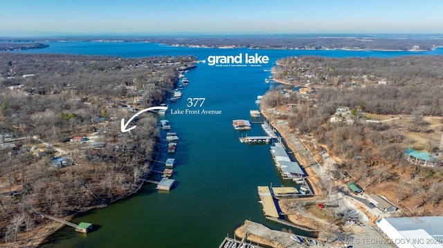 birds eye view of property featuring a water view