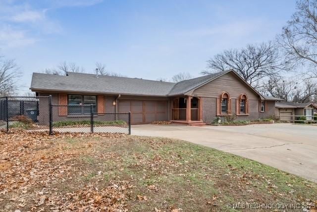 ranch-style home with a garage