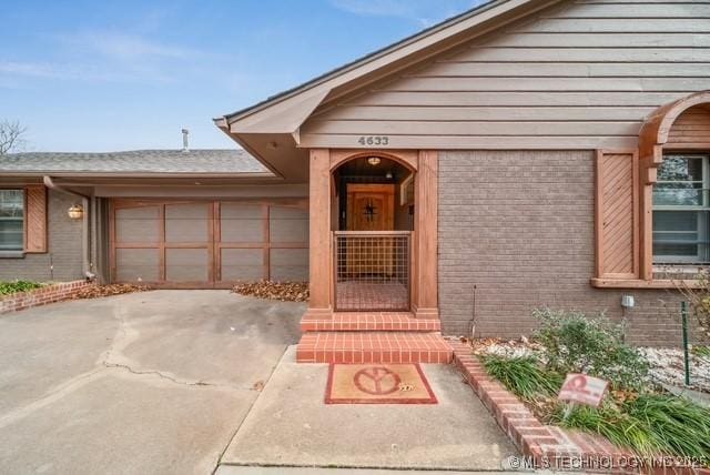 property entrance featuring a garage