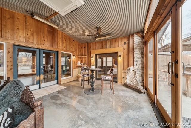 view of patio / terrace featuring ceiling fan and french doors