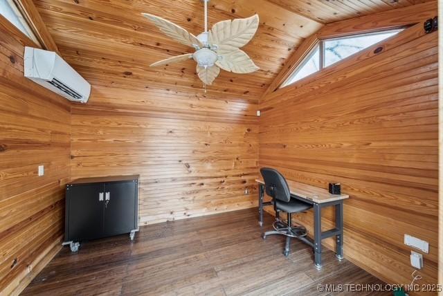 home office with a wall mounted air conditioner, ceiling fan, hardwood / wood-style flooring, wooden ceiling, and lofted ceiling