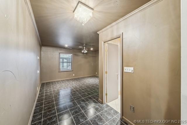 interior space featuring ceiling fan with notable chandelier