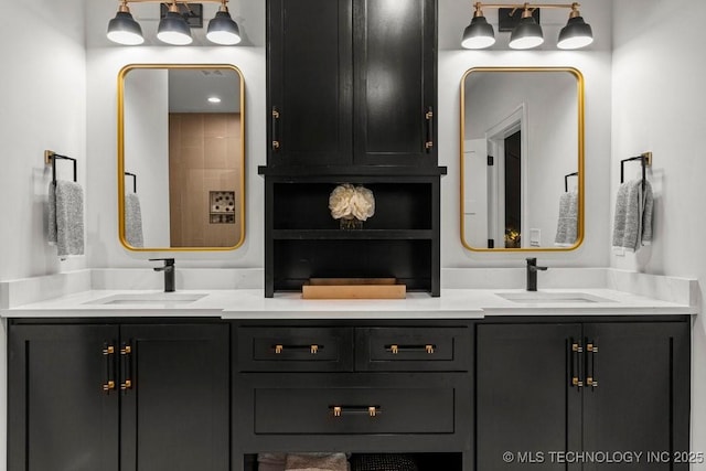 full bath with a sink and double vanity