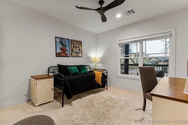 carpeted bedroom with ceiling fan