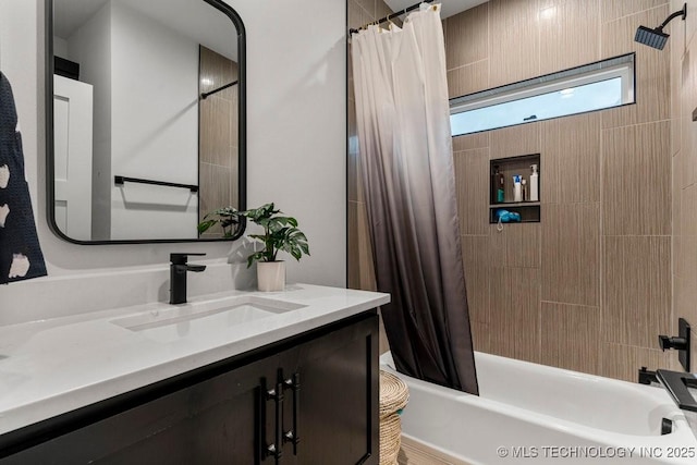 bathroom with vanity and shower / tub combo with curtain