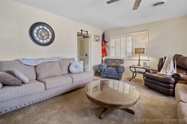 living room featuring light carpet and ceiling fan