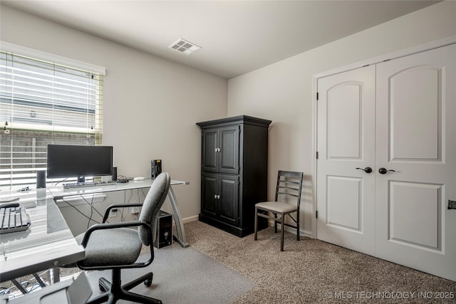 home office with carpet flooring