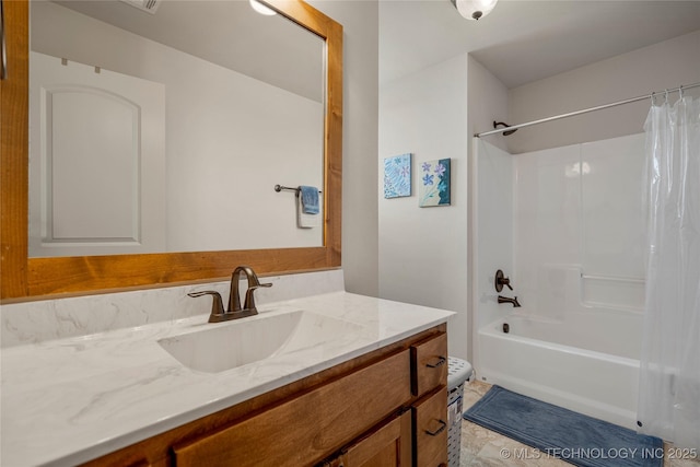 full bathroom featuring shower / bath combination with curtain, vanity, and toilet