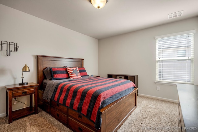 bedroom featuring light carpet