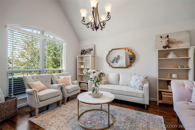 living room featuring high vaulted ceiling, dark hardwood / wood-style floors, and a notable chandelier