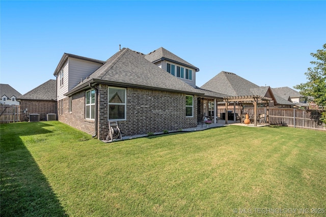 rear view of house featuring a yard, a pergola, a patio, and cooling unit