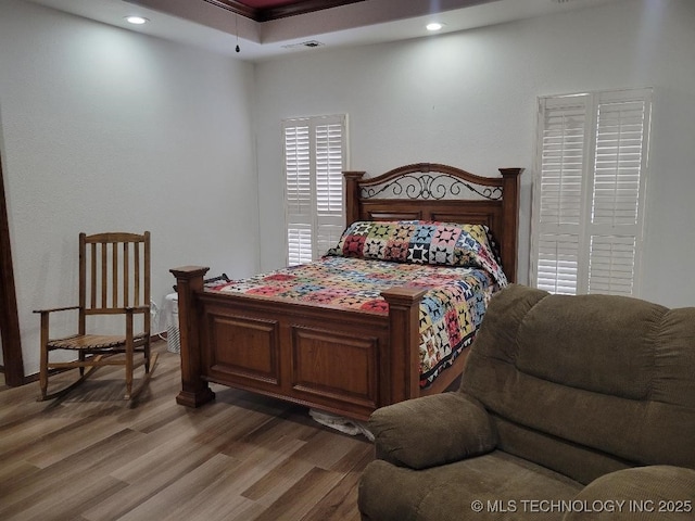 bedroom featuring hardwood / wood-style floors