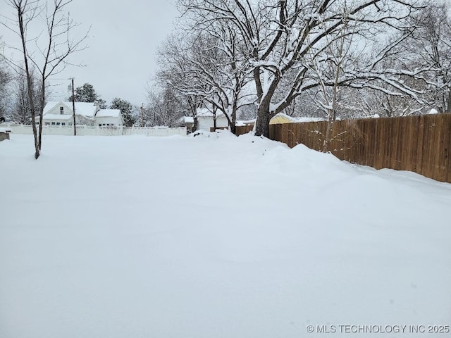 view of snowy yard