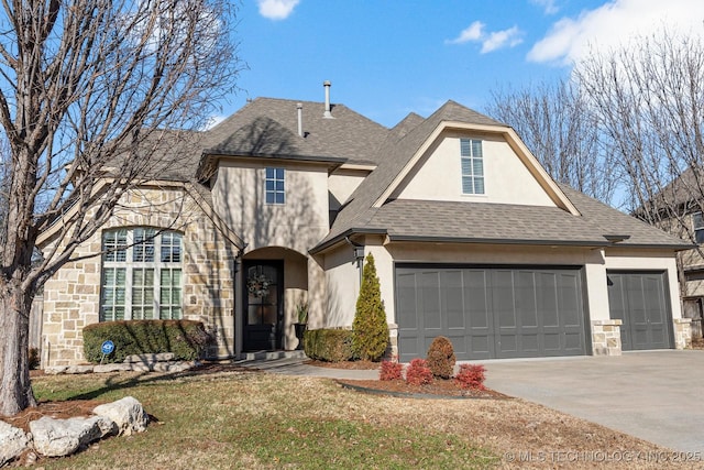 view of front of home with a garage