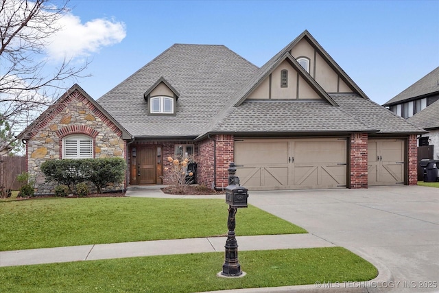 view of front of house featuring a garage and a front yard