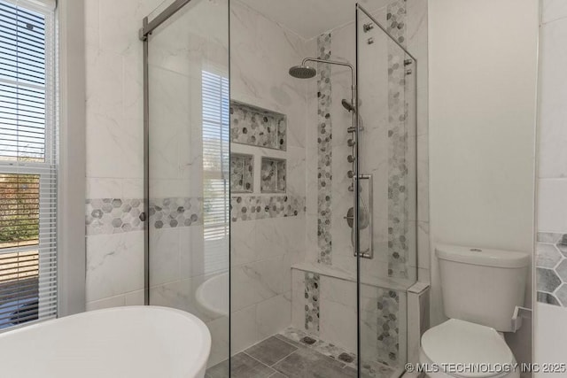 bathroom featuring plus walk in shower and toilet