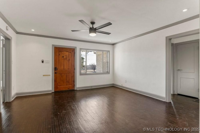 interior space featuring ceiling fan, dark wood-type flooring, and ornamental molding