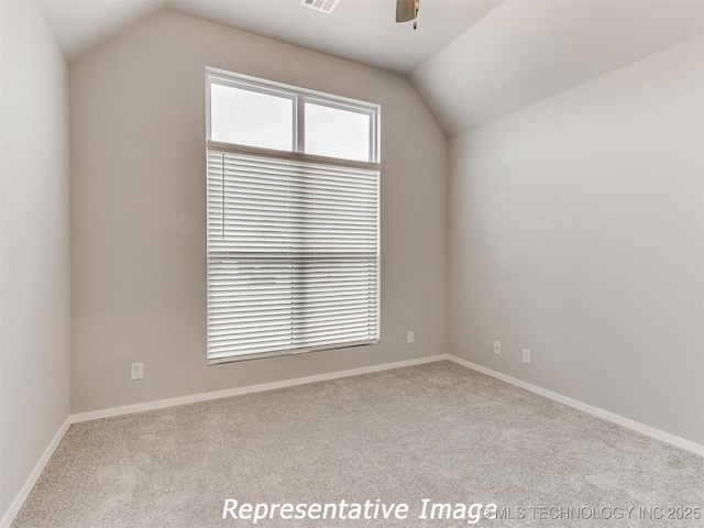 additional living space with light carpet, ceiling fan, and lofted ceiling