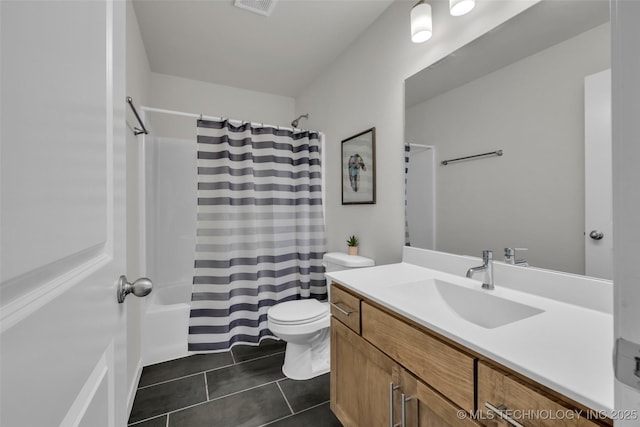 full bathroom featuring tile patterned floors, vanity, shower / tub combo, and toilet