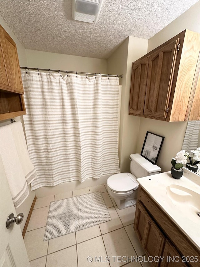 1504 N 26th St, Broken Arrow, OK 74014 - full bathroom with a textured ceiling, vanity, and tile patterned flooring