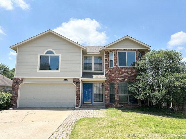 1504 N 26th St, Broken Arrow, OK 74014 - view of front of house featuring concrete driveway, brick siding, a garage, and a front yard