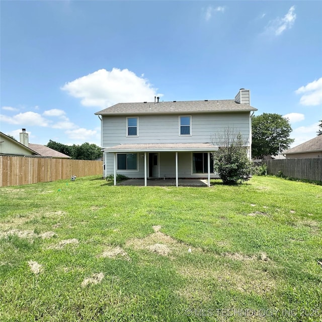 1504 N 26th St, Broken Arrow, OK 74014 - rear view of house featuring a fenced backyard, a patio, and a chimney