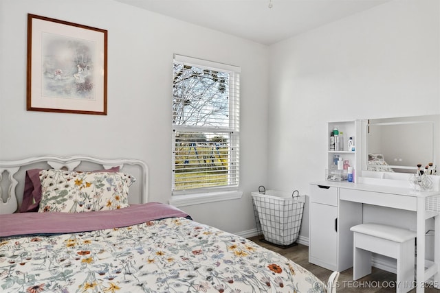 bedroom featuring multiple windows