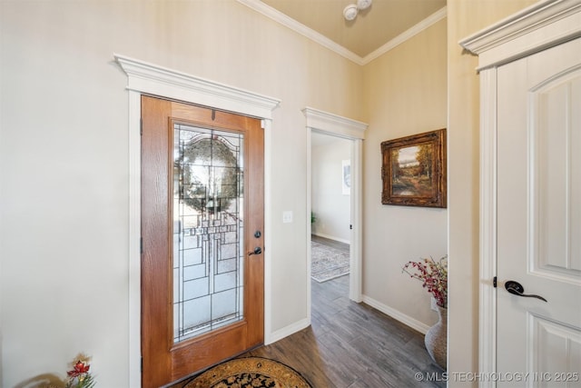 foyer with baseboards, dark wood-style flooring, and crown molding