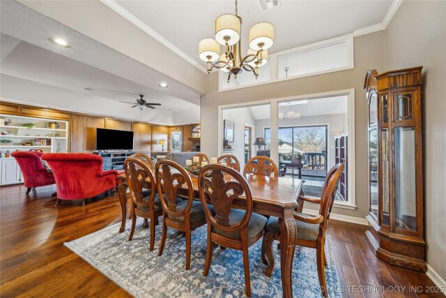 dining space featuring hardwood / wood-style floors, recessed lighting, baseboards, and ornamental molding