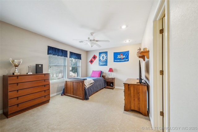 carpeted bedroom with recessed lighting, baseboards, and ceiling fan