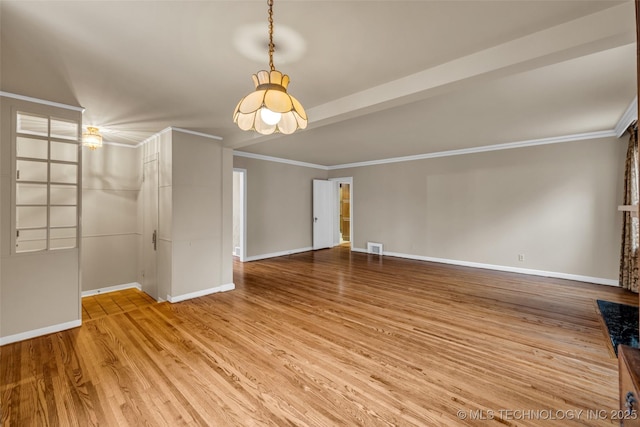 interior space with crown molding and light wood-type flooring