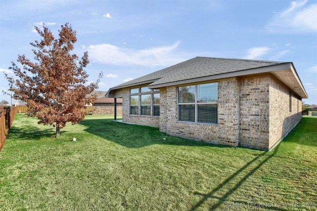 exterior space with a lawn