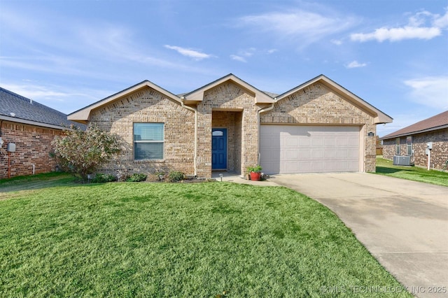 view of front of home featuring central AC, a garage, and a front lawn