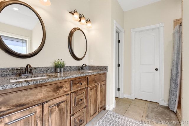 bathroom with vanity and tile patterned floors