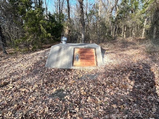 view of entry to storm shelter