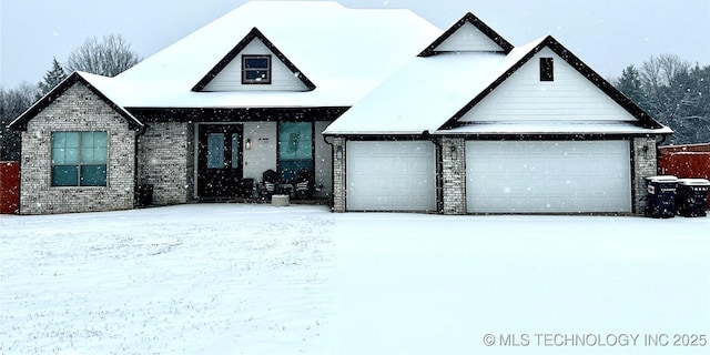 view of front of property with a garage