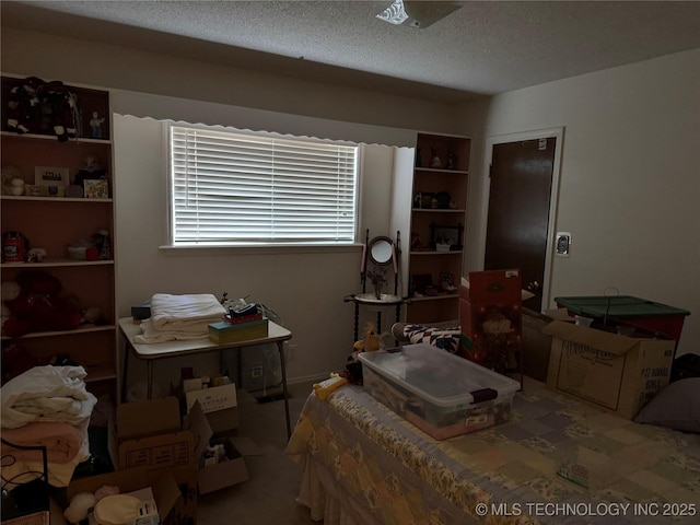 bedroom with a textured ceiling