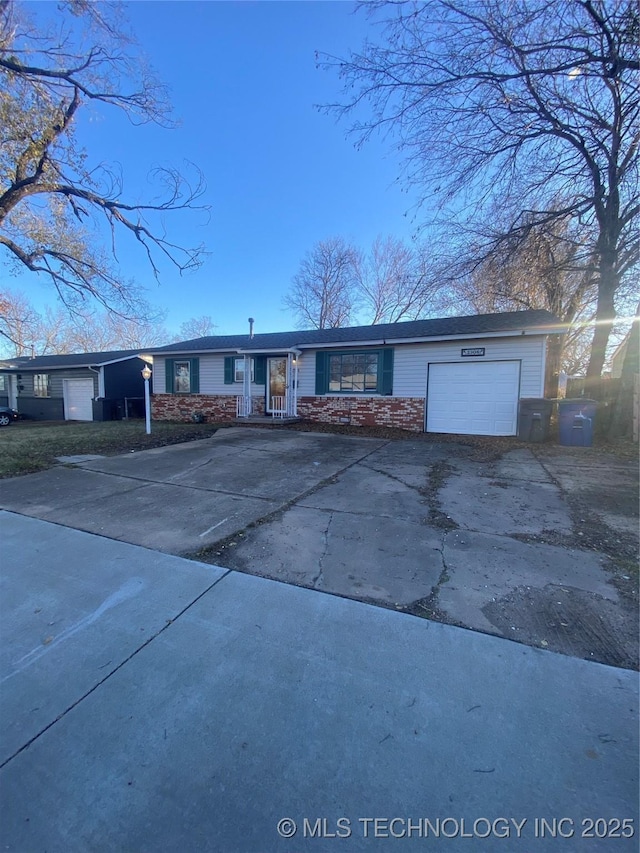 single story home featuring a garage