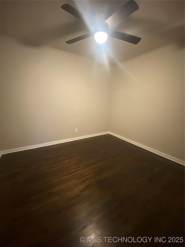 unfurnished room featuring dark wood-type flooring