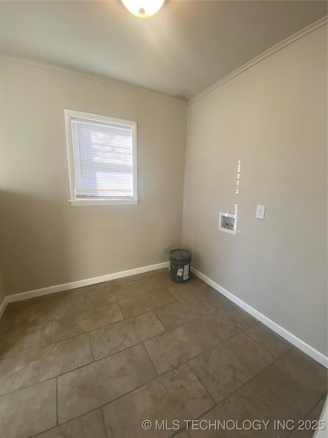 unfurnished room featuring ornamental molding