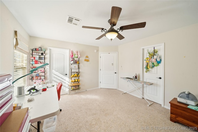 recreation room featuring ceiling fan and light carpet