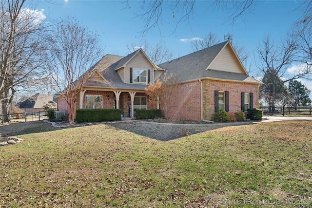 view of front of home with a front lawn