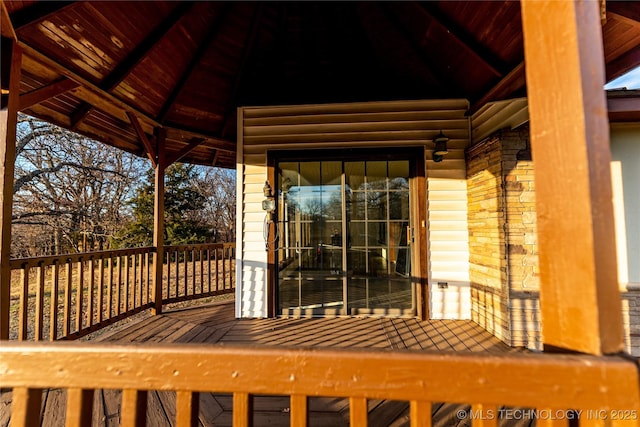 wooden deck with a gazebo