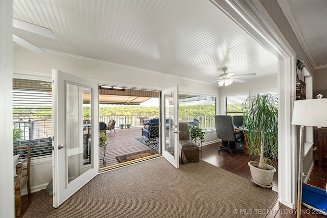 sunroom / solarium featuring ceiling fan and french doors