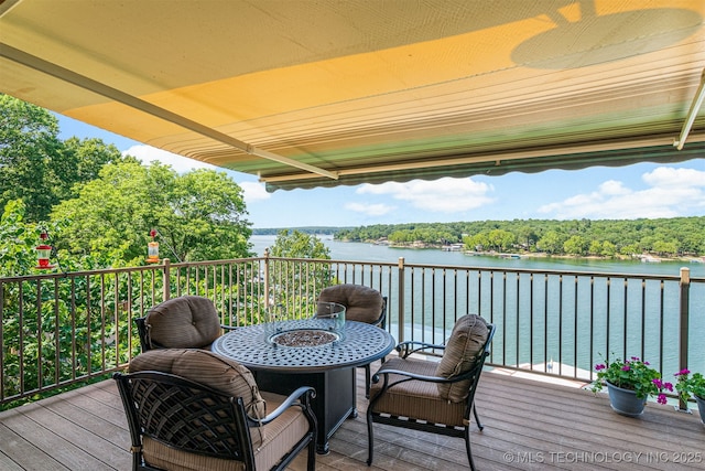 wooden terrace with a water view