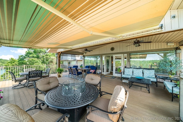 wooden deck featuring an outdoor hangout area