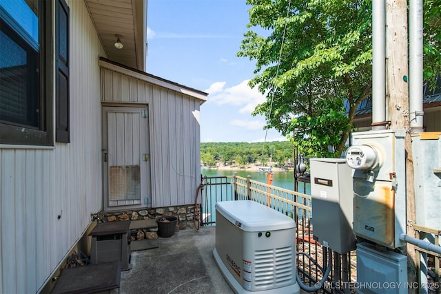 view of patio / terrace with a water view