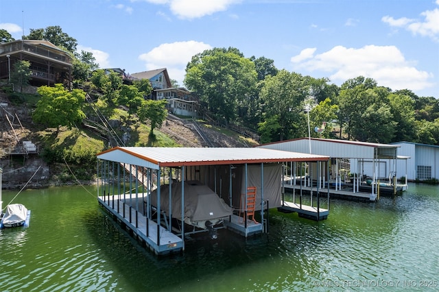 view of dock with a water view